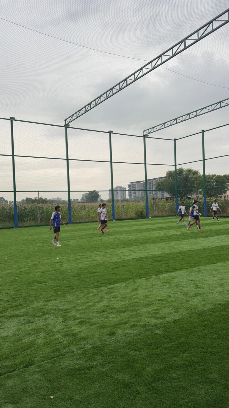 Players on the BOXPARK football turf