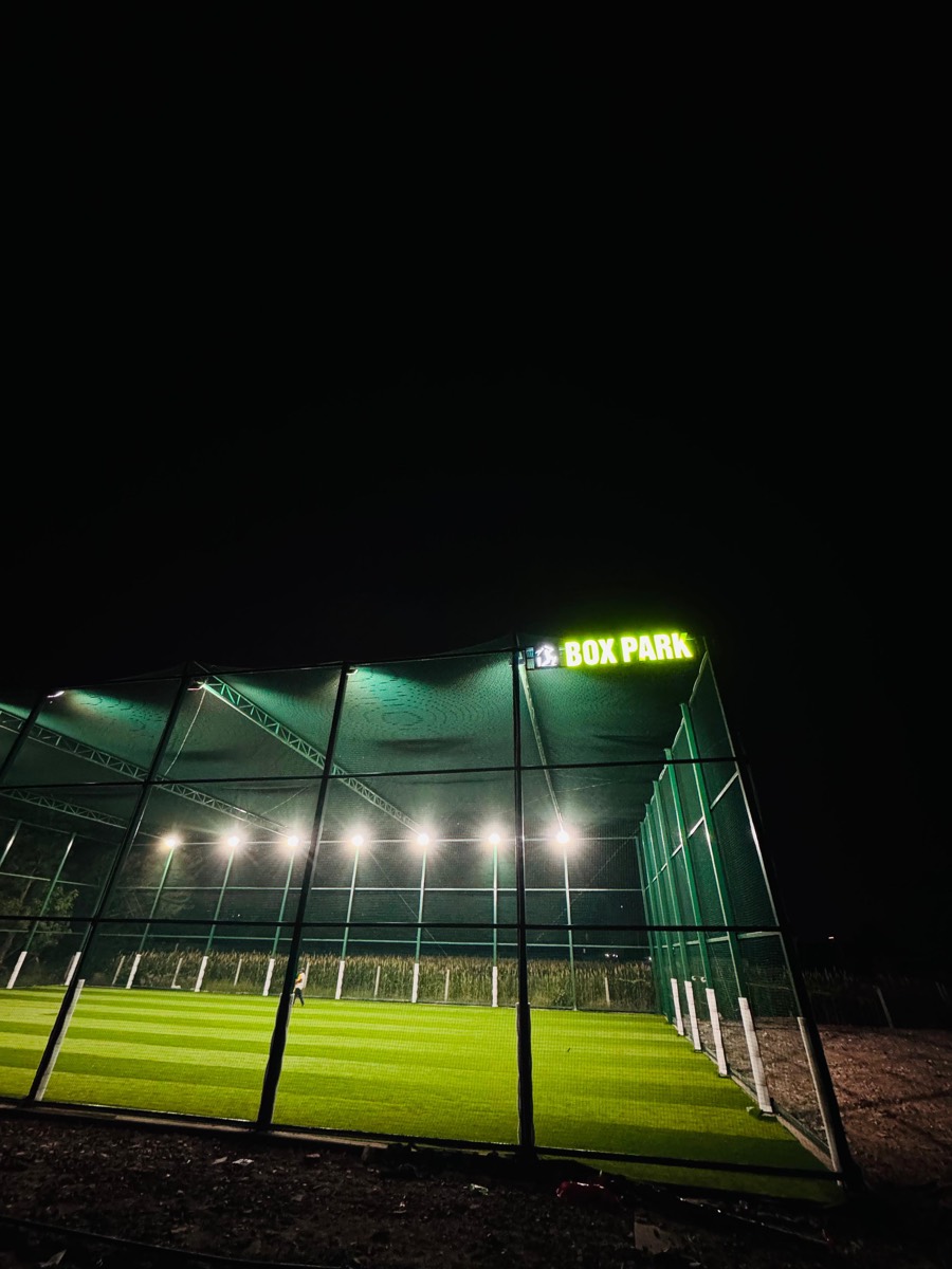 BOXPARK arena lit up at night