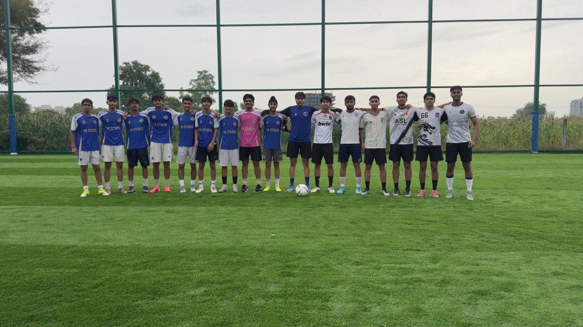 Team lined up on the football turf